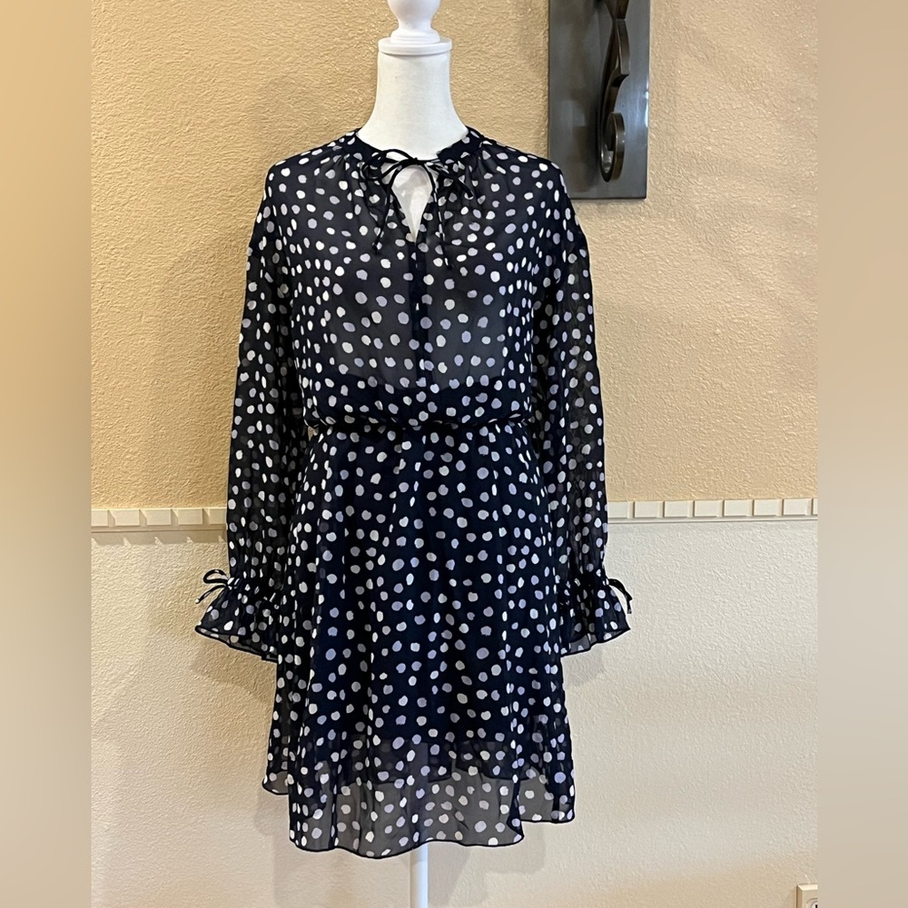 Polka dot black and white midi dress. Stretchy waist, long balloon sleeves. 6